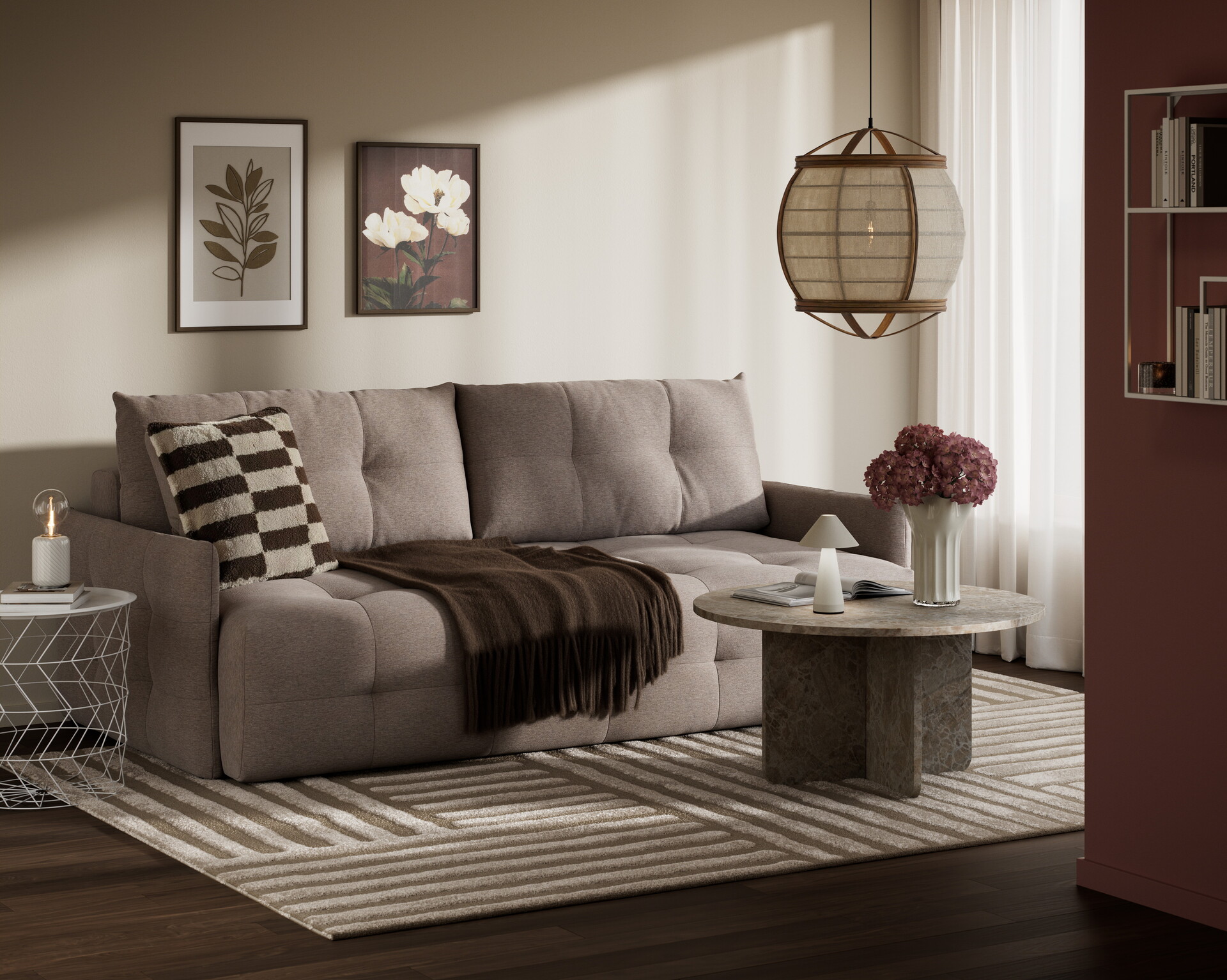 En beige bäddsoffa i ett vardagsrum