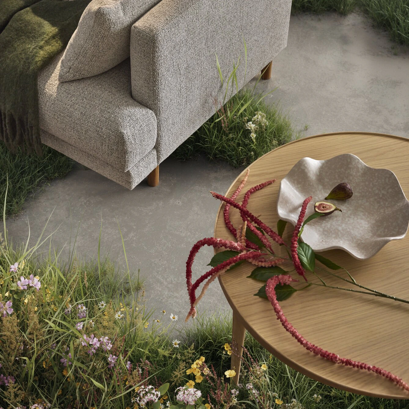 vardagsrum som beklätts med växtlighet, del av soffa och soffbord