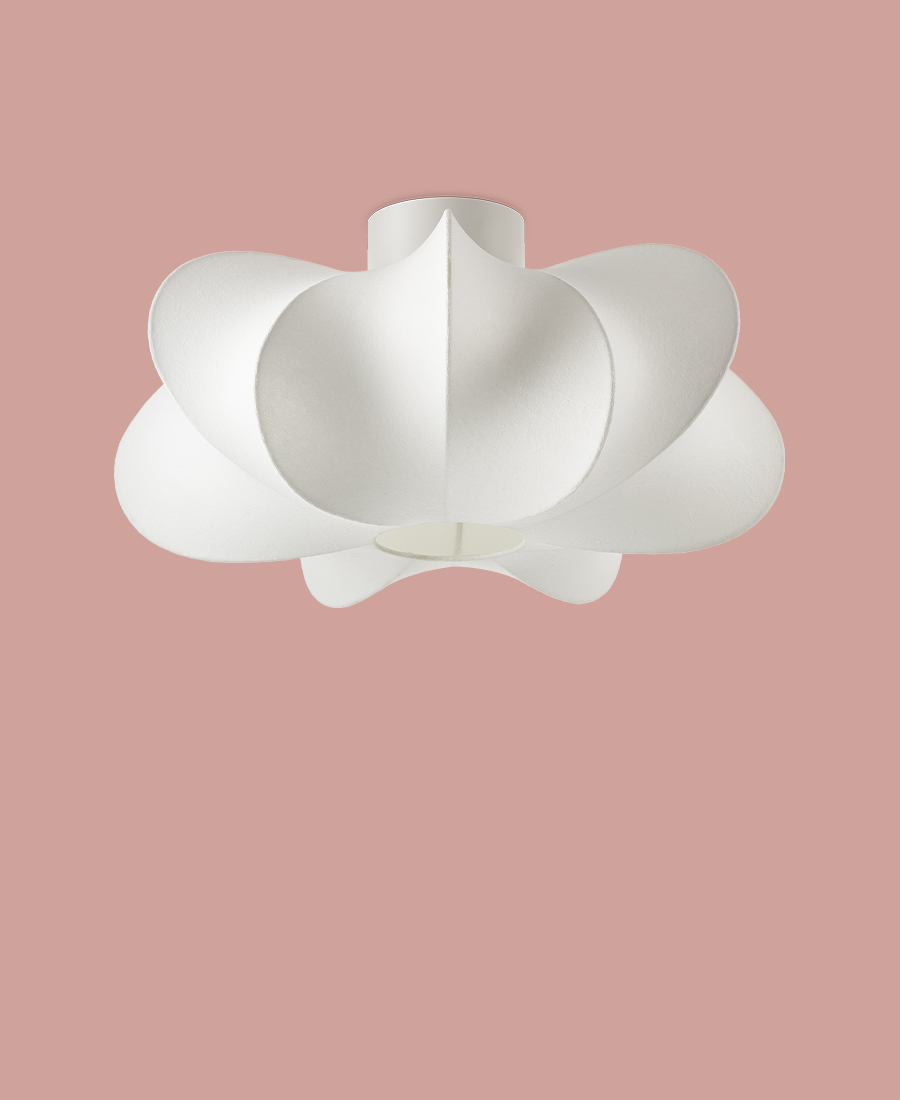 en vit plafond i organisk form är frilagd mot en rosa bakgrund