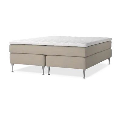  en beige kontinentalsäng
