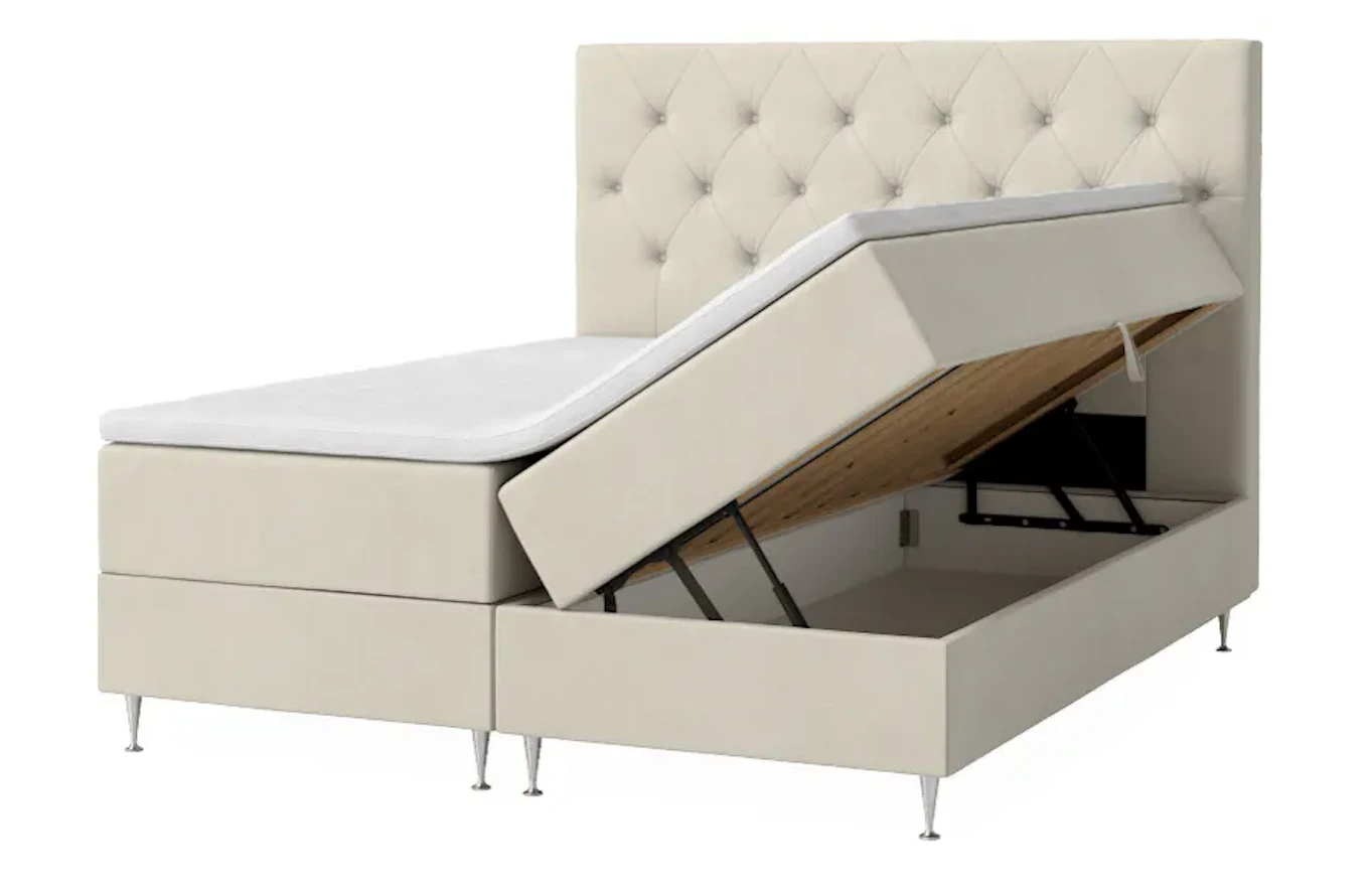 en beige kontinentalsäng med förvaring